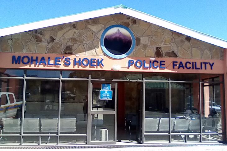 POLICE OFFICERS DIG UP ANOTHER DEAD BODY