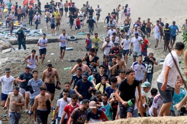 About 60,000 migrants arrive in Ceuta in 24 hours, Spanish territory's leader says<br/>About 60,000 migrants arrive in Ceuta in 24 hours, Spanish territory's leader says<br/>About 60,000 migrants arrive in Ceuta in 24 hours, Spanish territory's leader says