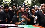 Families of victims of Ethiopian plane crash are given black soil for burial ceremonies.