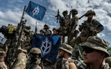 Leader of anti-Putin force says expect more Russian border raids