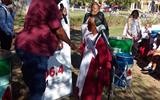 LITTLE MAYOR DONATES DUSTBINS
