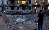 At least 13 killed in large-scale Russian missile and drone strikes on Kyiv