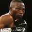 Four arrested over boxing champion's murder in South Africa
